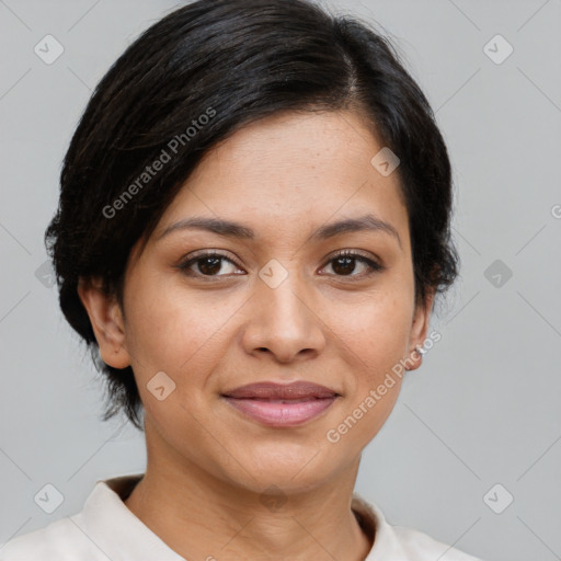 Joyful latino young-adult female with short  brown hair and brown eyes