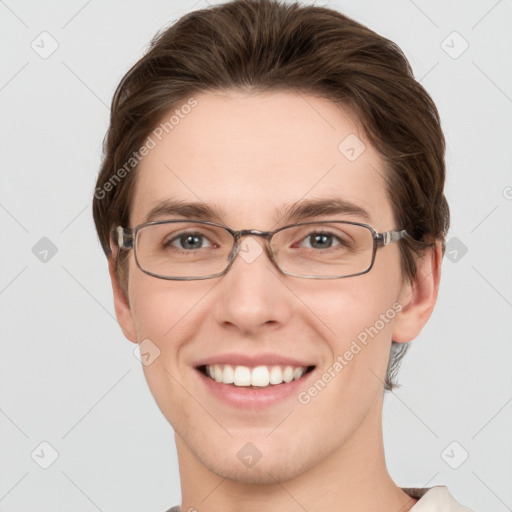 Joyful white young-adult female with short  brown hair and grey eyes