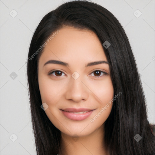 Joyful latino young-adult female with long  black hair and brown eyes