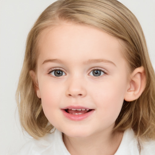 Joyful white child female with medium  brown hair and blue eyes