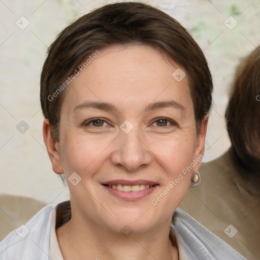 Joyful white adult female with short  brown hair and brown eyes