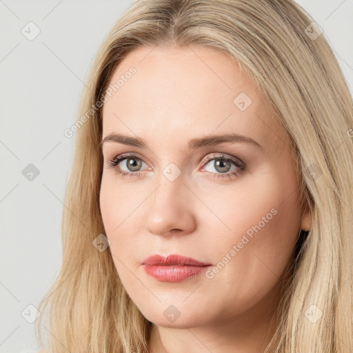 Neutral white young-adult female with long  brown hair and brown eyes