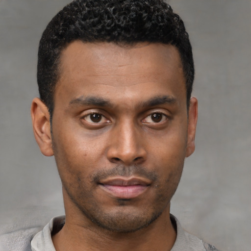 Neutral latino young-adult male with short  brown hair and brown eyes
