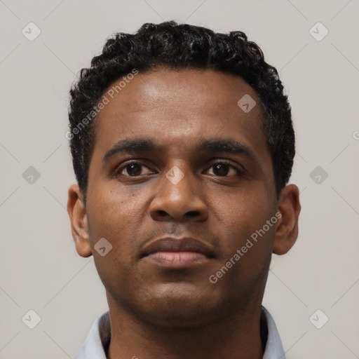 Neutral black young-adult male with short  black hair and brown eyes