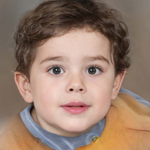 Joyful white child male with short  brown hair and brown eyes