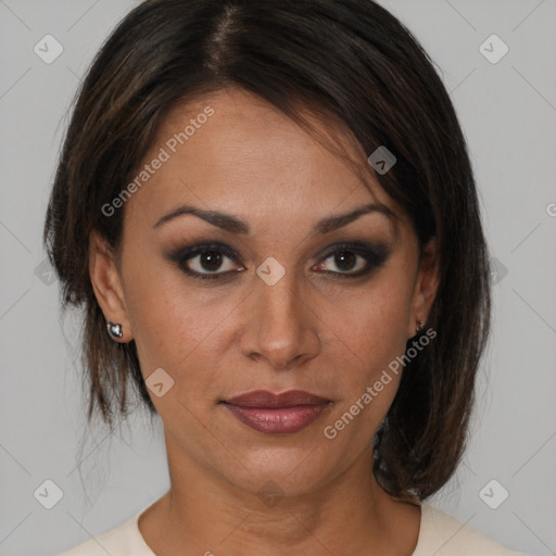 Joyful latino young-adult female with medium  brown hair and brown eyes