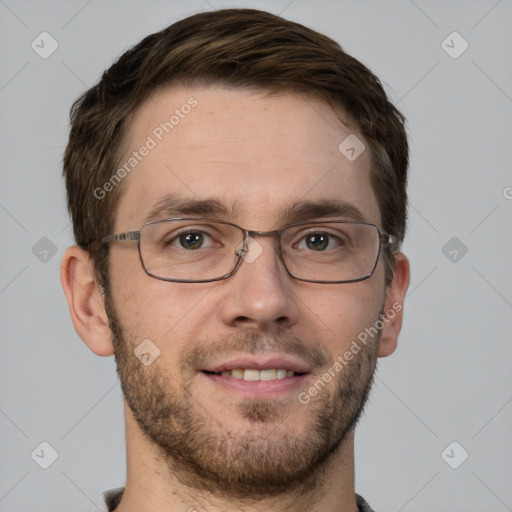 Joyful white adult male with short  brown hair and grey eyes