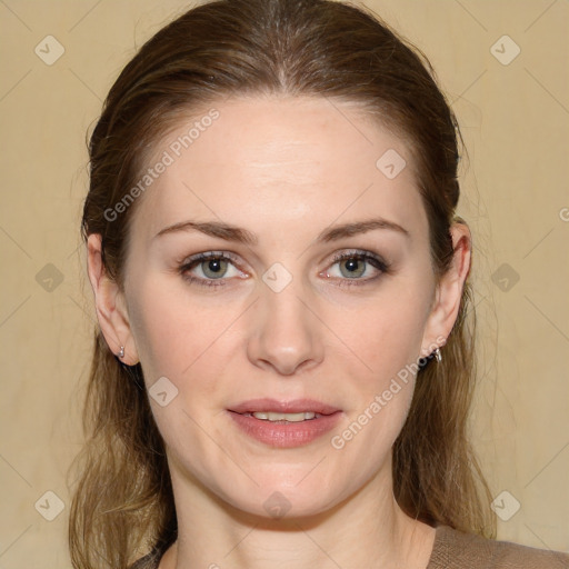 Joyful white young-adult female with medium  brown hair and green eyes