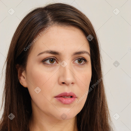 Neutral white young-adult female with long  brown hair and brown eyes