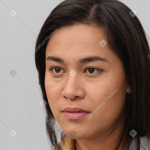 Joyful asian young-adult female with medium  brown hair and brown eyes