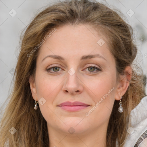 Joyful white young-adult female with long  brown hair and blue eyes