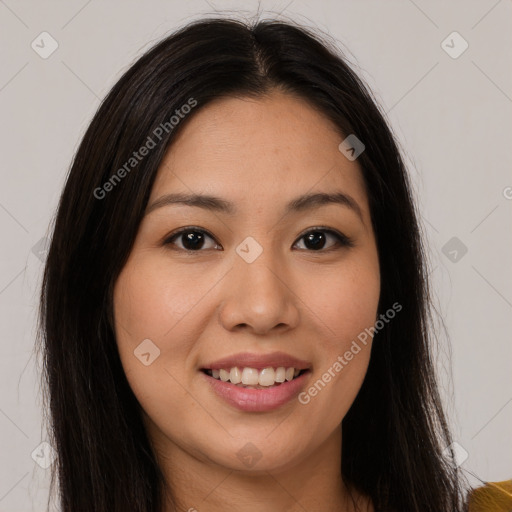 Joyful asian young-adult female with long  brown hair and brown eyes