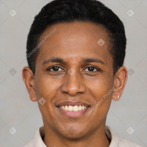 Joyful latino young-adult male with short  black hair and brown eyes