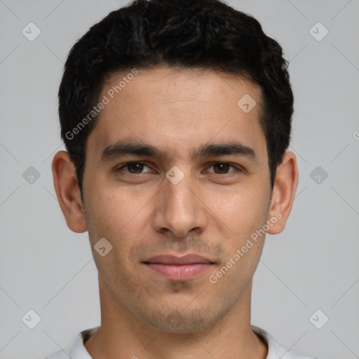 Joyful white young-adult male with short  black hair and brown eyes