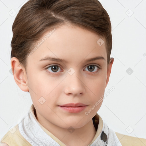 Joyful white child female with short  brown hair and grey eyes