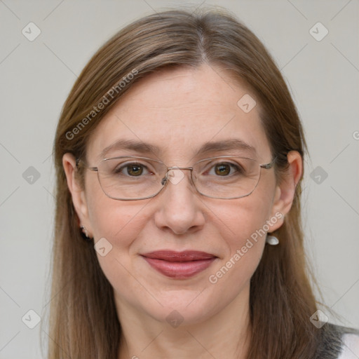 Joyful white adult female with long  brown hair and grey eyes