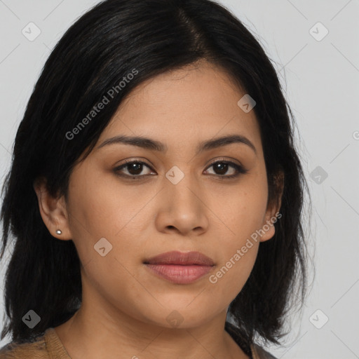 Joyful asian young-adult female with long  brown hair and brown eyes