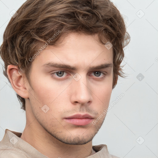 Neutral white young-adult male with short  brown hair and grey eyes