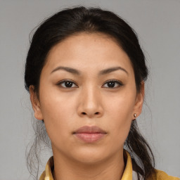 Neutral asian young-adult female with medium  brown hair and brown eyes