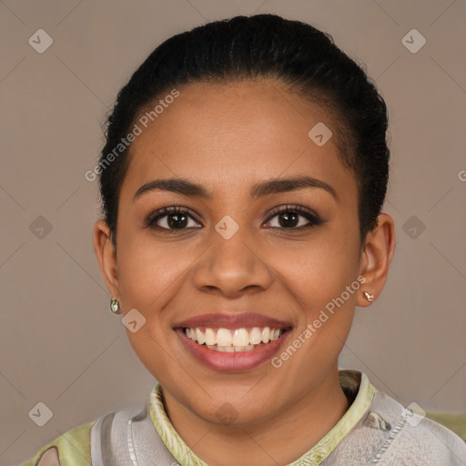 Joyful latino young-adult female with short  brown hair and brown eyes