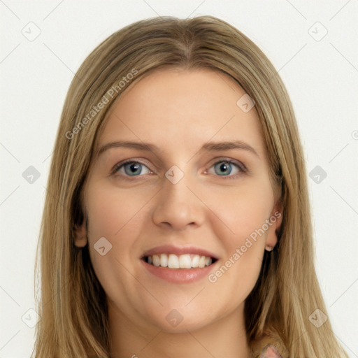 Joyful white young-adult female with long  brown hair and green eyes