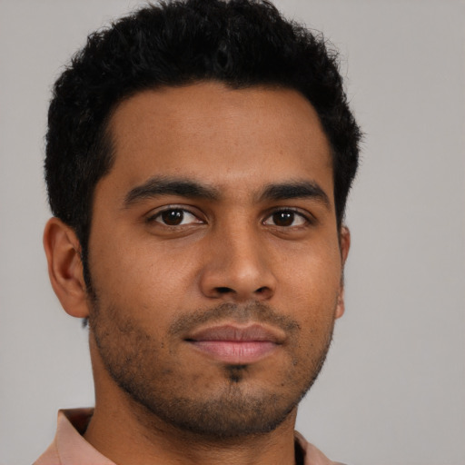 Neutral latino young-adult male with short  black hair and brown eyes