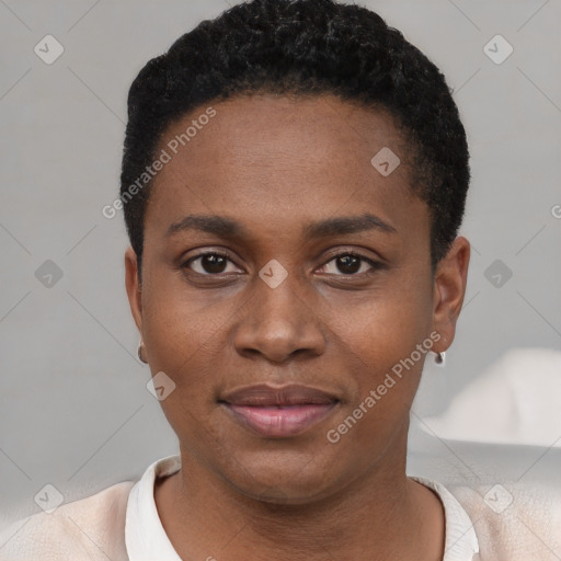 Joyful black young-adult female with short  black hair and brown eyes