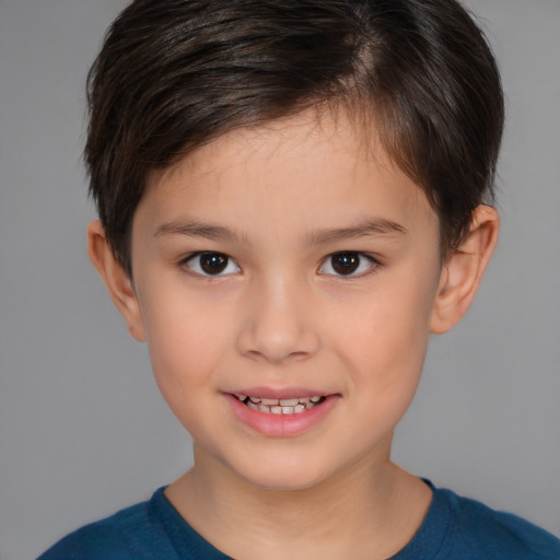 Joyful white child female with short  brown hair and brown eyes