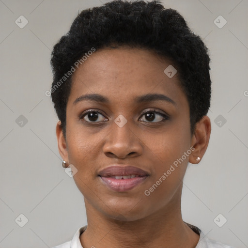 Joyful black young-adult female with short  brown hair and brown eyes