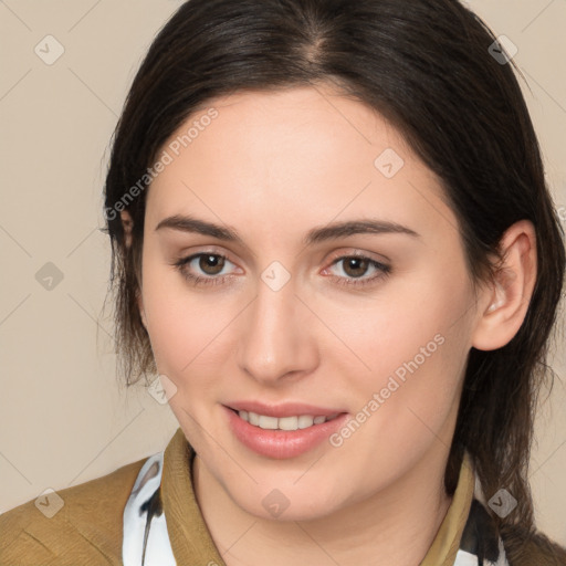 Joyful white young-adult female with medium  brown hair and brown eyes