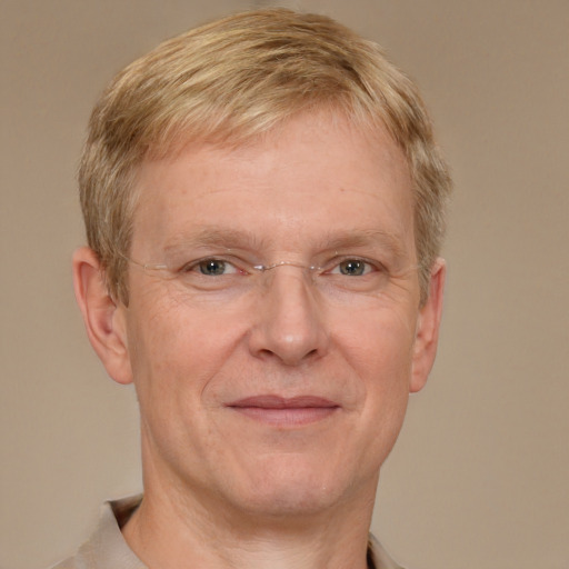 Joyful white middle-aged male with short  brown hair and grey eyes