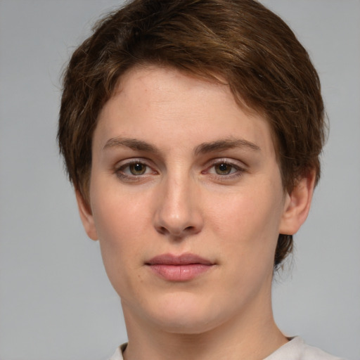 Neutral white young-adult female with short  brown hair and green eyes