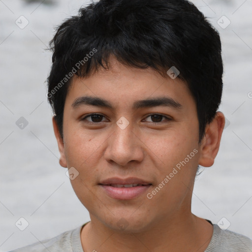 Joyful latino young-adult male with short  black hair and brown eyes