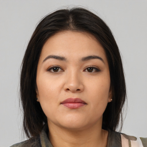Neutral latino young-adult female with medium  brown hair and brown eyes