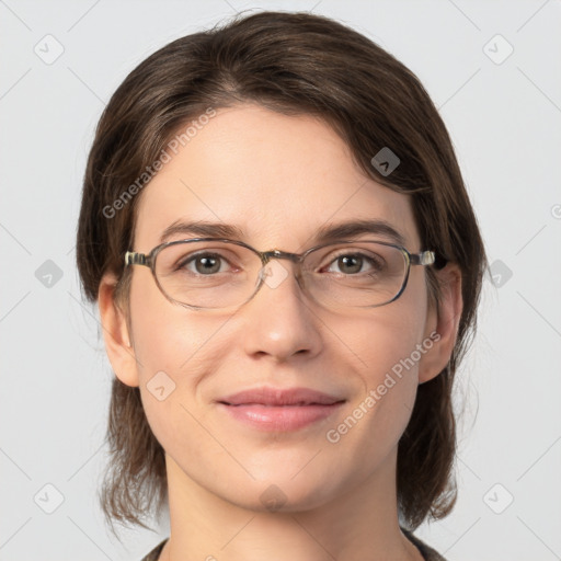 Joyful white young-adult female with medium  brown hair and grey eyes