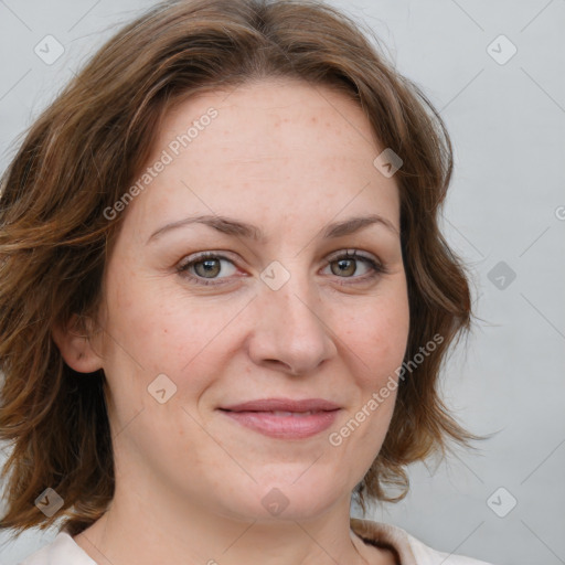 Joyful white young-adult female with medium  brown hair and blue eyes