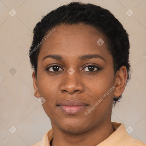 Joyful black young-adult female with short  brown hair and brown eyes