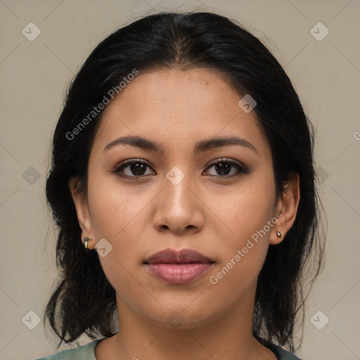 Joyful latino young-adult female with medium  brown hair and brown eyes