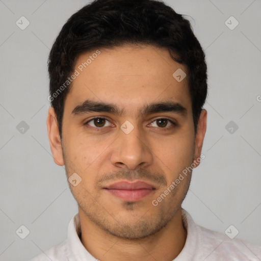 Joyful latino young-adult male with short  black hair and brown eyes