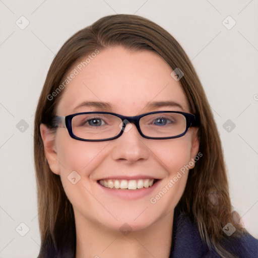 Joyful white young-adult female with long  brown hair and blue eyes