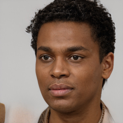Neutral black young-adult male with short  brown hair and brown eyes