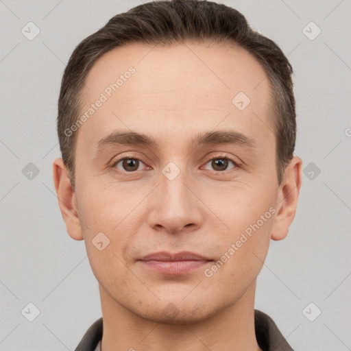 Joyful white young-adult male with short  brown hair and brown eyes