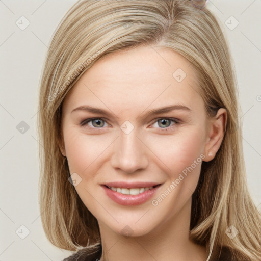 Joyful white young-adult female with long  brown hair and grey eyes