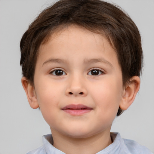 Joyful white child female with short  brown hair and brown eyes