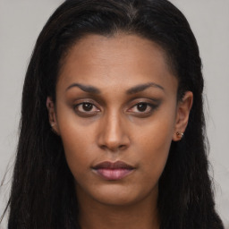 Neutral black young-adult female with long  brown hair and brown eyes