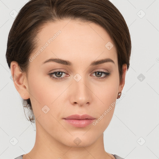 Neutral white young-adult female with short  brown hair and brown eyes