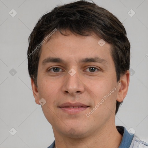 Joyful white young-adult male with short  brown hair and brown eyes