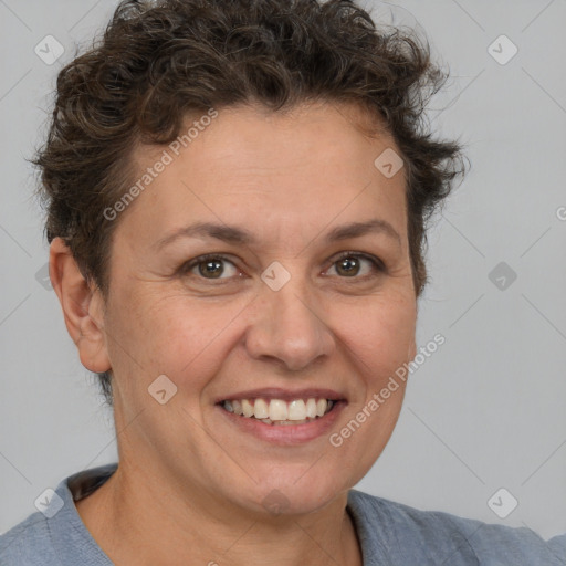 Joyful white adult female with short  brown hair and brown eyes