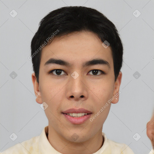 Joyful asian young-adult male with short  black hair and brown eyes