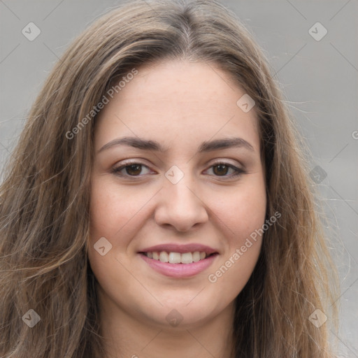 Joyful white young-adult female with long  brown hair and grey eyes